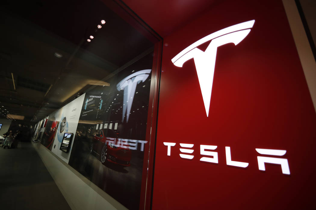 Tesla is walking back its plan to close most retail stores worldwide. The company says it still plans to move to fully online sales but it won’t close as many stores as originally thought. (AP P ...