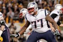 New England Patriots offensive tackle Trent Brown (77) plays against the Pittsburgh Steelers in an NFL football game, Sunday, Dec. 16, 2018, in Pittsburgh. (AP Photo/Don Wright)