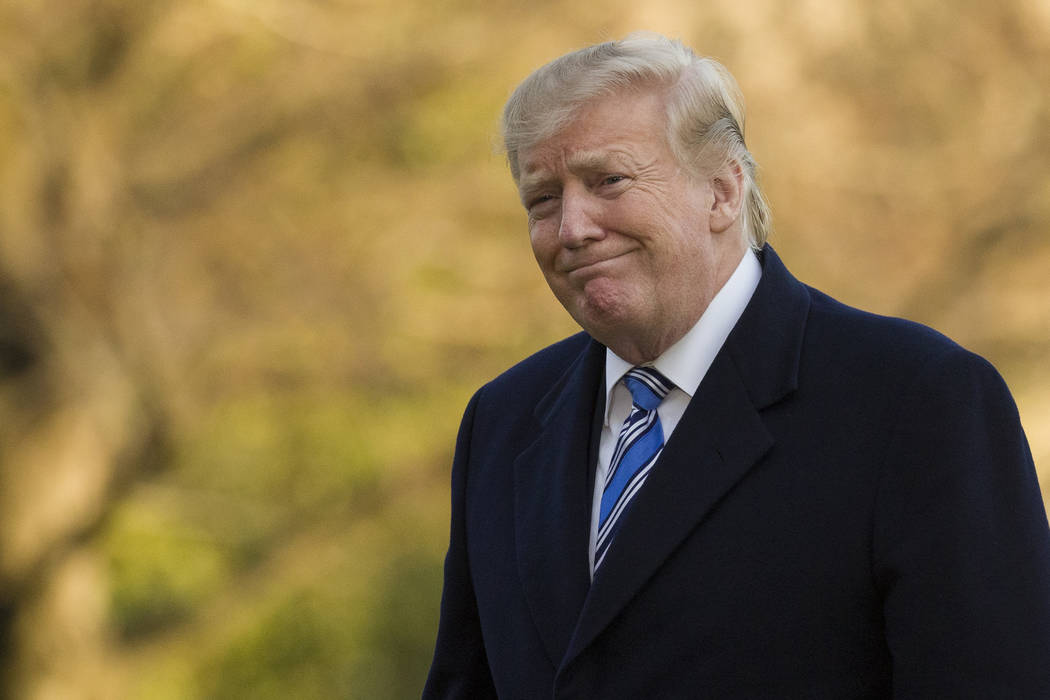 President Donald Trump smiles as he walks on the South Lawn after stepping off Marine One at the White House, Sunday, March 10, 2019, in Washington. (Alex Brandon/AP)