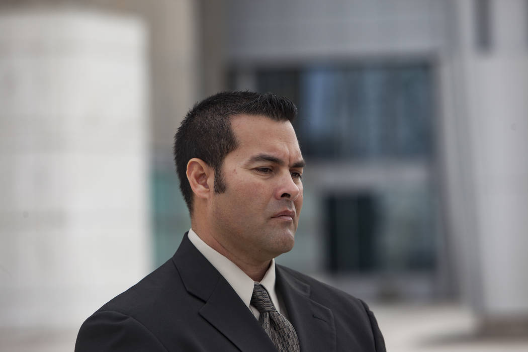 Gus Redding stands in front of media outside the federal court house in Las Vegas, Monday, March 11, 2019. Redding is a current employee at the Nevada National Security Site who alleges in a feder ...