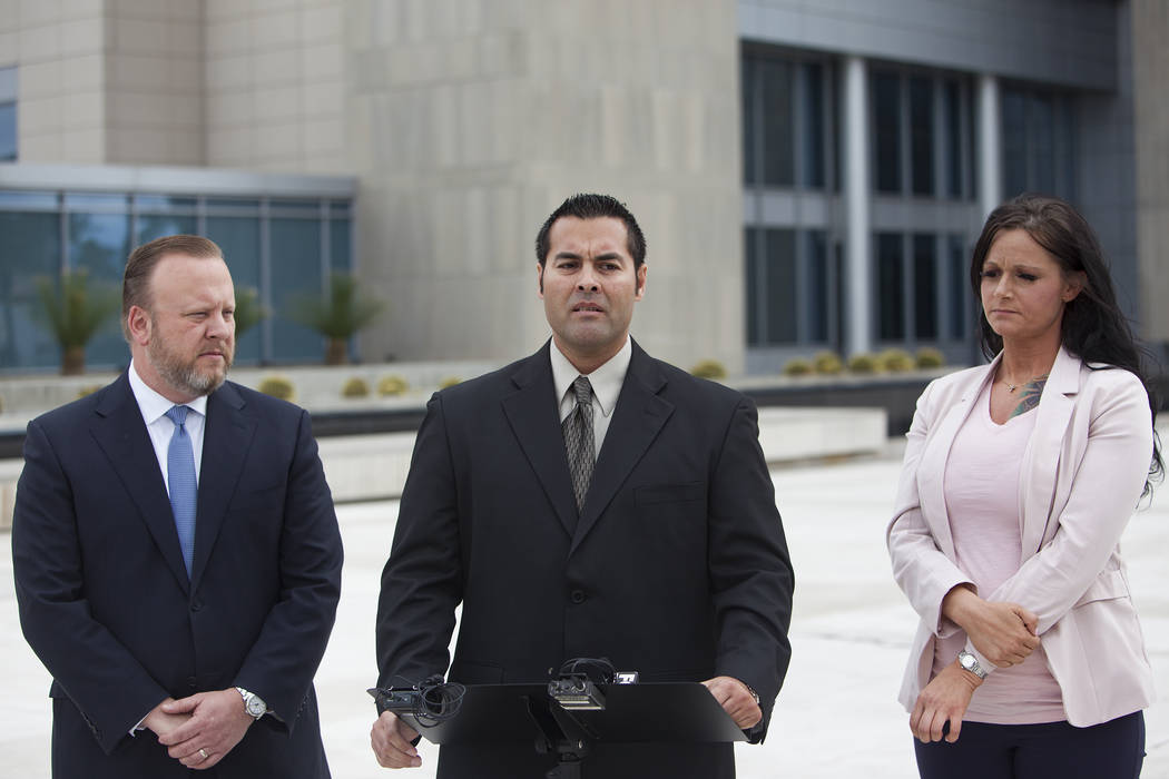 Gus Redding speaks to the media outside the federal court house in Las Vegas, Monday, March 11, 2019. Redding is a current employee at the Nevada National Security Site who alleges in a federal la ...