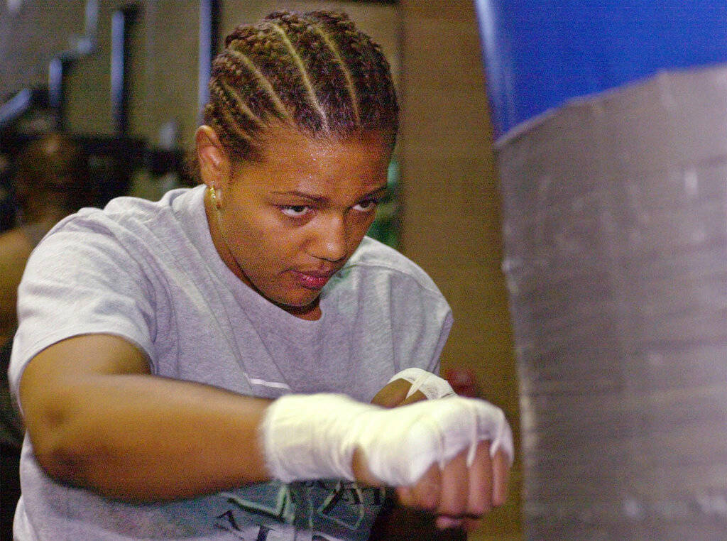 In this June 16, 2000, file photo, Freeda Foreman works out in a gym in Las Vegas. The 42-year-old daughter of former heavyweight champion George Foreman died at a Houston-area home. The Harris Co ...