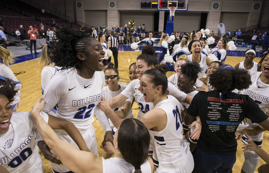 Centennial's girls basketball team celebrates after beating Bishop Gorman, 78-47 to win the Class 4A state girls championship on Friday, March 1, 2019 at Orleans Arena. Benjamin Hager/Las Vegas Re ...