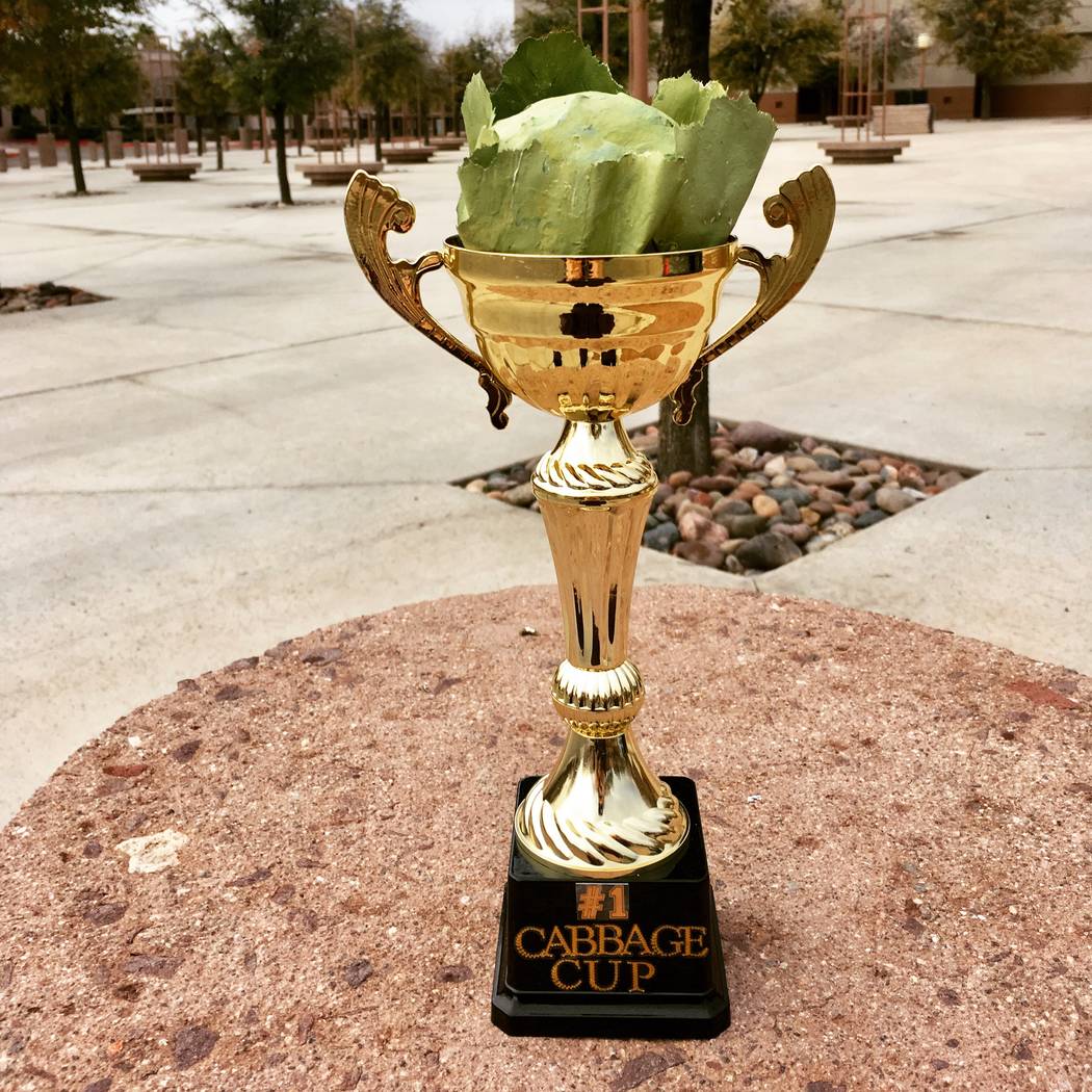 Pictured is the cabbage cup that students Payton Gallow, Jayden Iurato, and Camila Godinez won for their 3-pound cabbage. (Garden Farms)