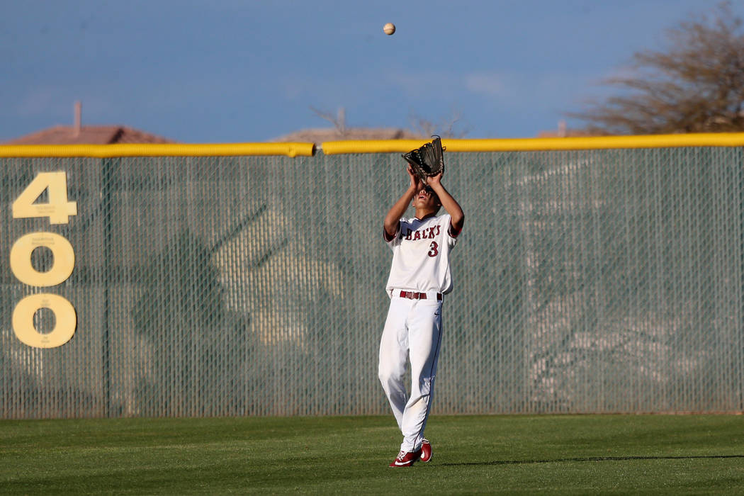 Desert Oasis' Tripp Edens (3) makes a catch in the outfield for an out against Palo Verde in the baseball game at Desert Oasis High School in Las Vegas, Tuesday, March 12, 2019. Erik Verduzco Las ...