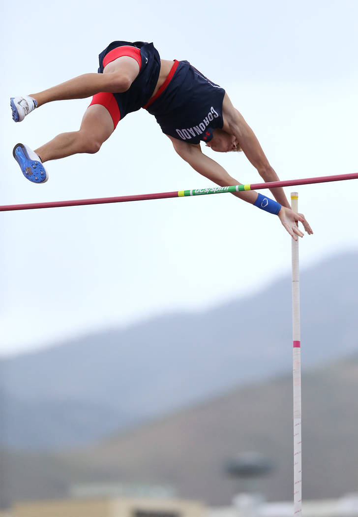 Coronadoճ Keaton Daniel clears 15ՠin the pole vault to tie for the title at the NIAA Track & Field Championships at Carson High in Carson City, Nev., on Friday, May 18, 2018. Cathl ...