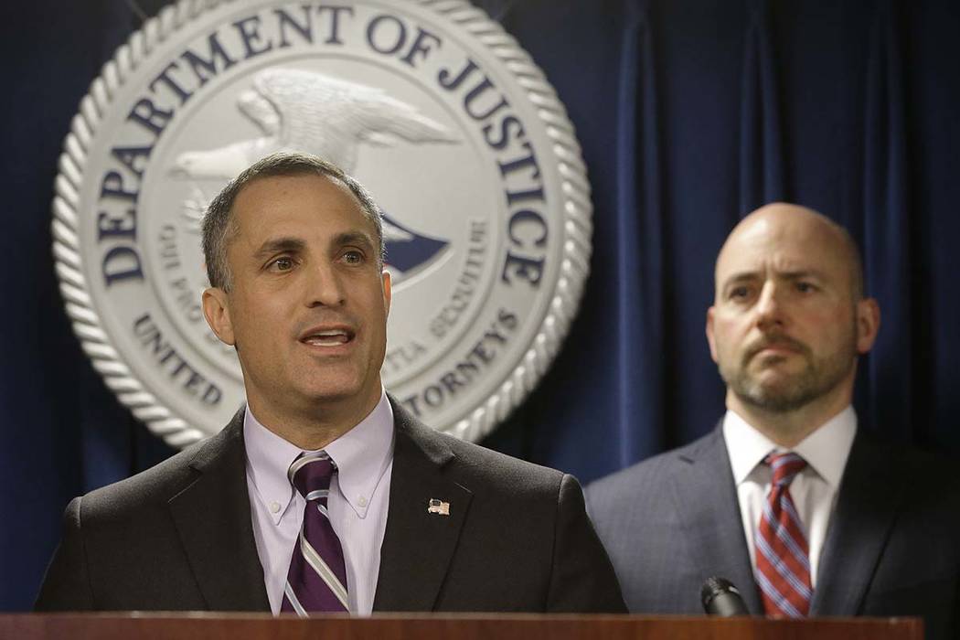 FBI Special Agent in Charge Boston Division Joseph Bonavolonta, left, and U.S. Attorney for District of Massachusetts Andrew Lelling face reporters as they announce indictments in a sweeping colle ...