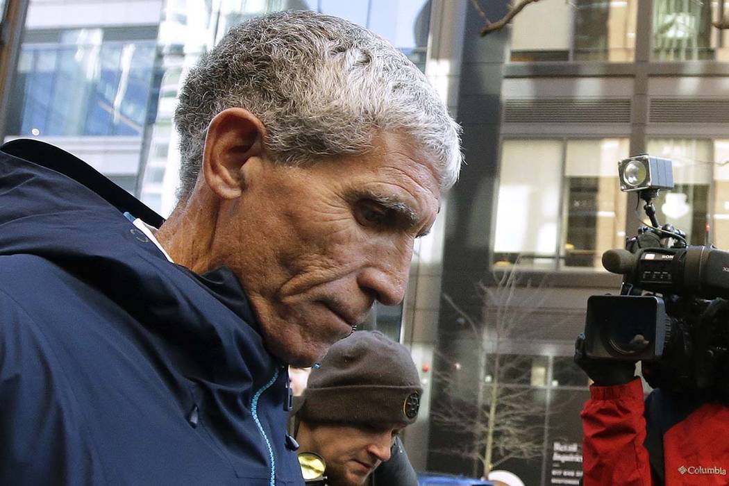 William "Rick" Singer, founder of the Edge College & Career Network, departs federal court in Boston on Tuesday, March 12, 2019, after he pleaded guilty to charges in a nationwide college admissio ...