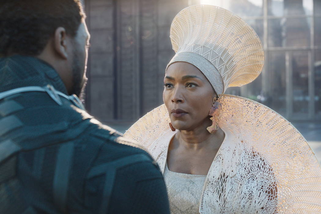 Chadwick Boseman, left, and Angela Bassett in a scene from "Black Panther." (Disney/Marvel Studios via AP)