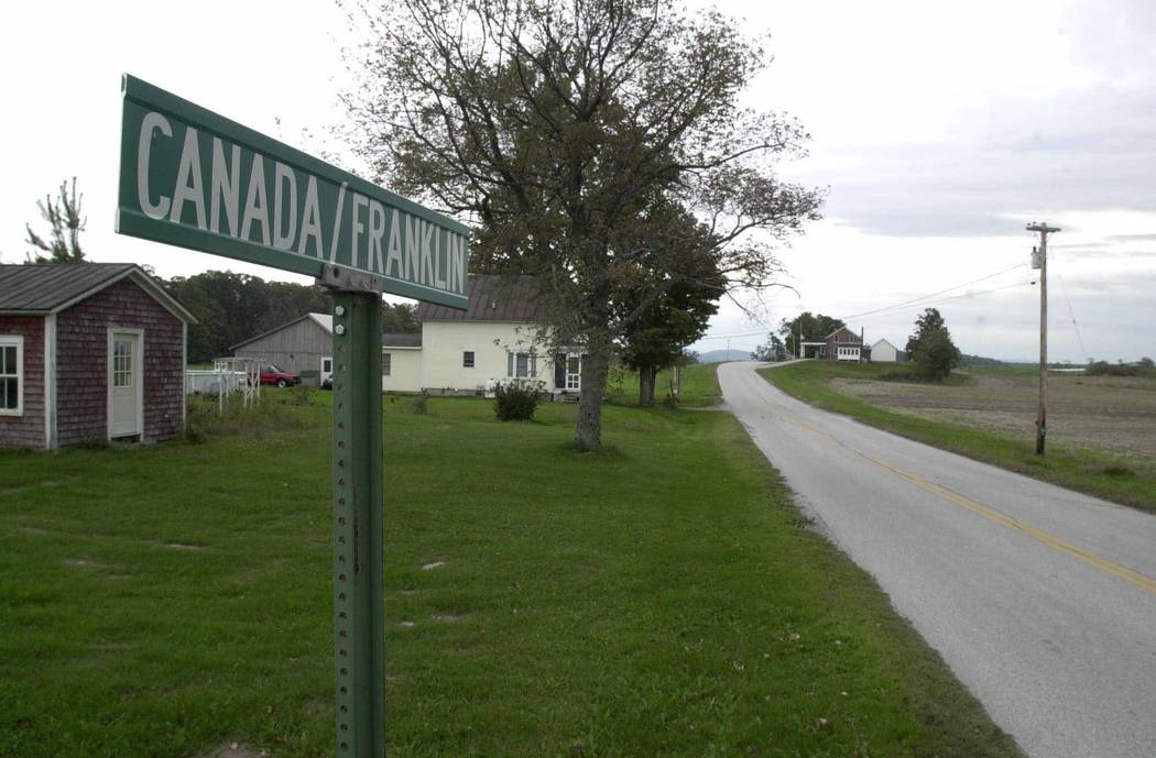 A sign marks the Canadian-U.S. border in Morse's Line, Vt. (AP Photo/Toby Talbot)