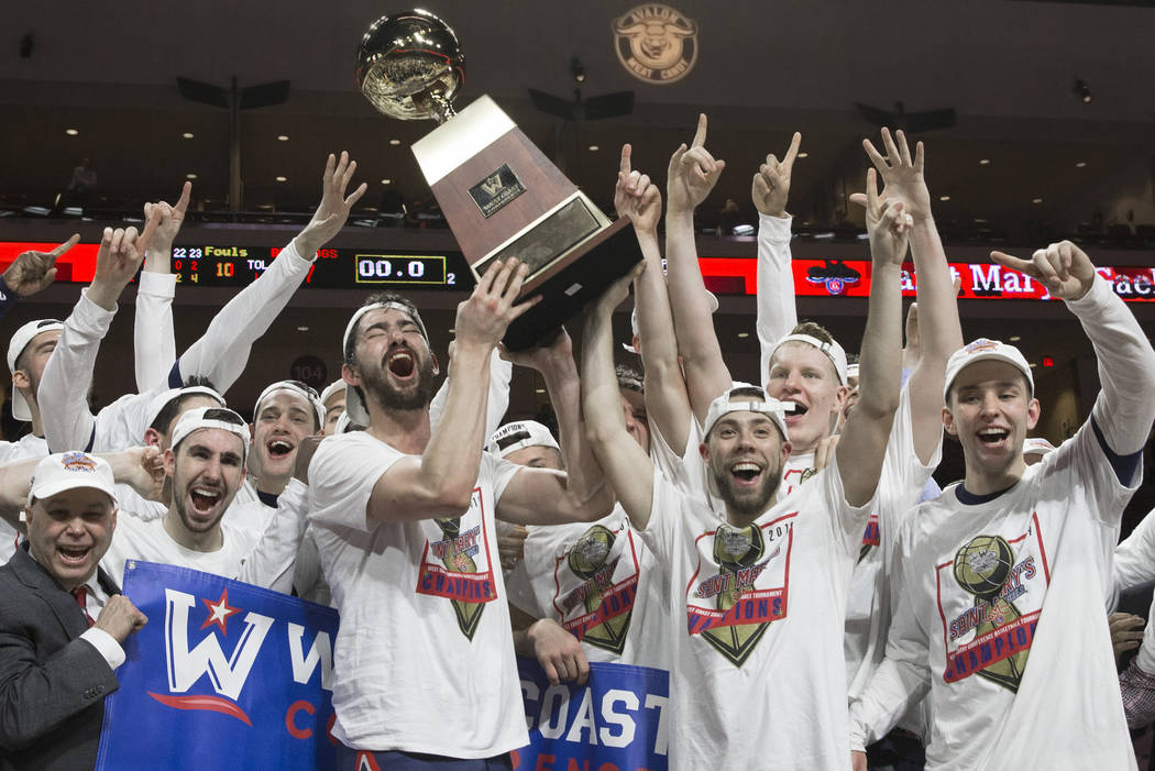 St. Mary's hoists the trophy after upsetting Gonzaga 60-47 to win the West Coast Conference championship on Tuesday, March 12, 2019, at Orleans Arena, in Las Vegas. (Benjamin Hager Review-Journal) ...