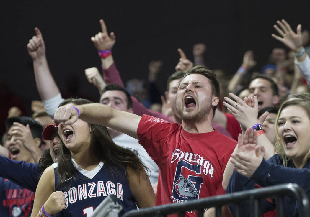 Gonzaga fans cheer for the Bulldogs in the second half during their West Coast Conference finals game with St. Mary's on Tuesday, March 12, 2019, at Orleans Arena, in Las Vegas. St. Mary's beat G ...