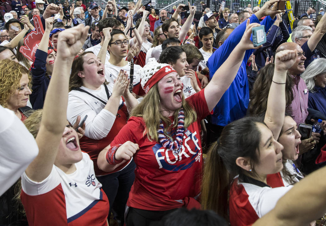 St. Mary's fans celebrate after the Gaels upset Gonzaga 60-47 to win the West Coast Conference championship on Tuesday, March 12, 2019, at Orleans Arena, in Las Vegas. (Benjamin Hager Review-Jour ...