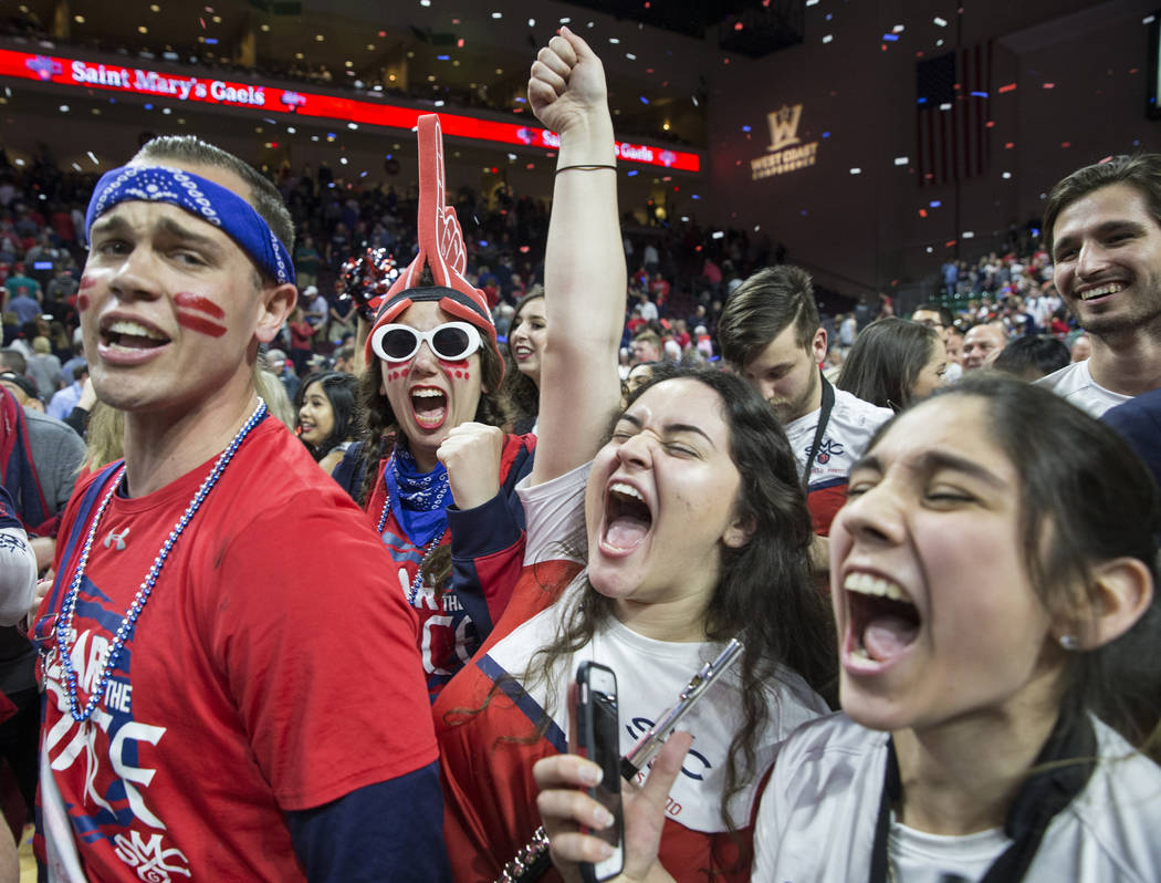 St. Mary's fans celebrates after the Gaels upset Gonzaga 60-47 to win the West Coast Conference championship on Tuesday, March 12, 2019, at Orleans Arena, in Las Vegas. (Benjamin Hager Review-Jou ...