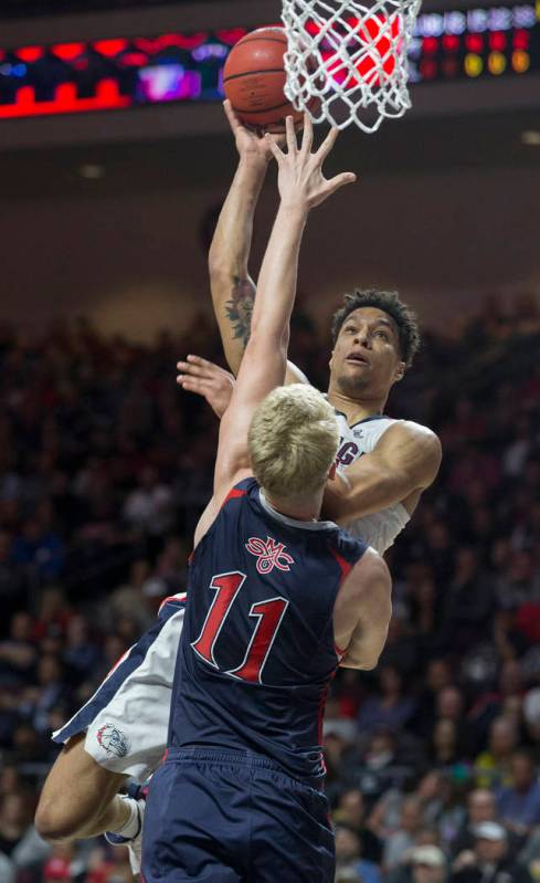 Gonzaga junior forward Brandon Clarke (15) shoots a jump shot over St. Mary's freshman forward Matthias Tass (11) in the first half during the West Coast Conference finals game on Tuesday, March 1 ...