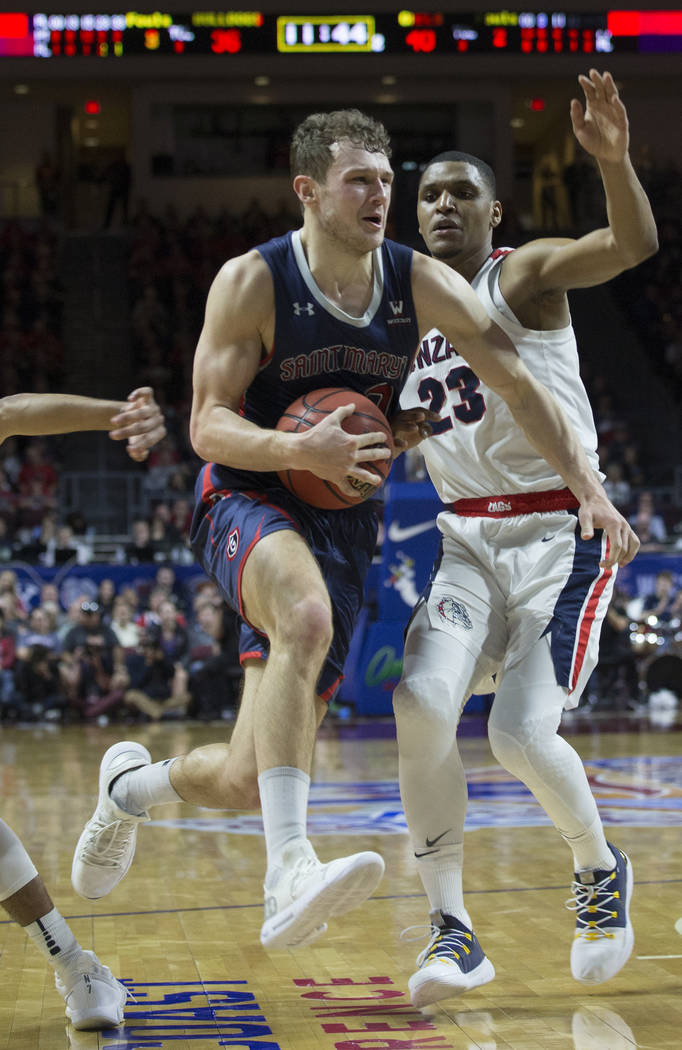 St. Mary's junior guard Tanner Krebs (00) drives past Gonzaga sophomore guard Zach Norvell Jr. (23) in the second half during the West Coast Conference finals game on Tuesday, March 12, 2019, at O ...
