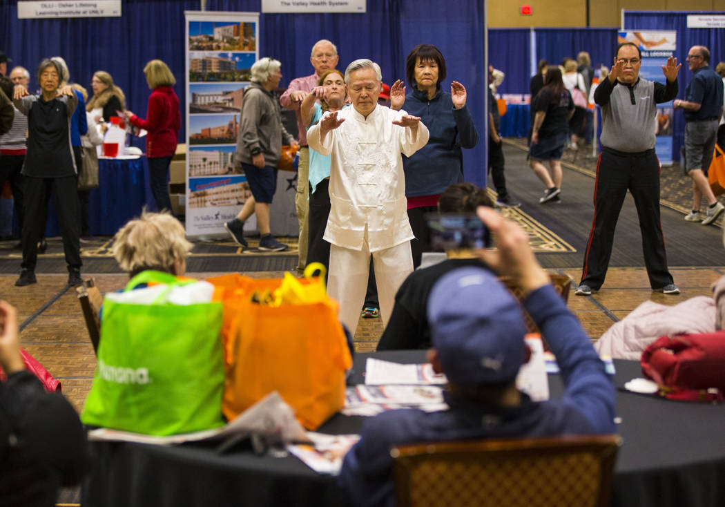 David Ou-Yang leads a beginners session in tai chi and qigong during the fifth annual AgeWell Expo at the Rio Convention Center in Las Vegas on Saturday, March 16, 2019. (Chase Stevens/Las Vegas R ...