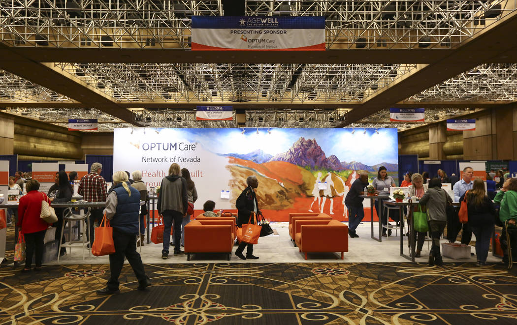 Attendees check out the OptumCare booth during the fifth annual AgeWell Expo at the Rio Convention Center in Las Vegas on Saturday, March 16, 2019. (Chase Stevens/Las Vegas Review-Journal) @csstev ...