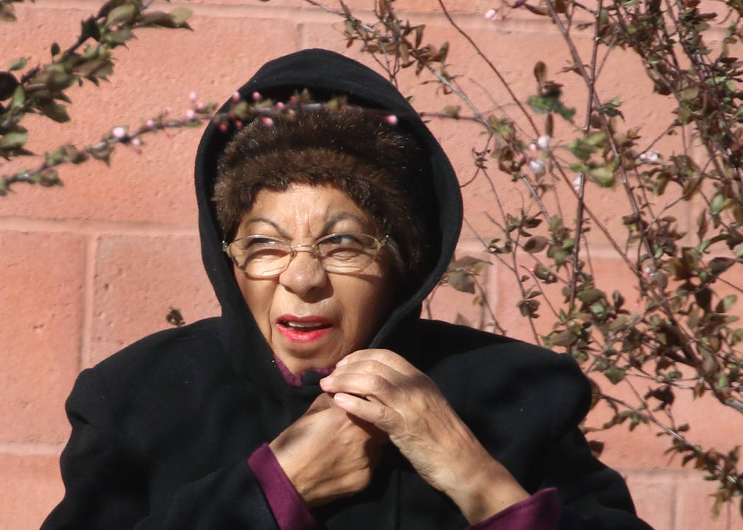 A woman bundled up as she walks in strong winds on Casino Center Boulevard on Wednesday, March. 13, 2019, in Las Vegas. Bizuayehu Tesfaye Las Vegas Review-Journal @bizutesfaye