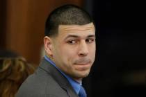 Massachusetts’ Supreme Court has reinstated the murder conviction for former New England Patriots tight end Aaron Hernandez, who killed himself in prison. (Stephan Savoia/AP, Pool)