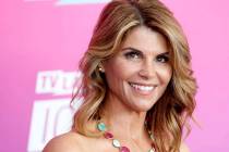 In this April 10, 2016 file photo, actress Lori Loughlin arrives at the TV Land Icon Awards in Santa Monica, California. (Rich Fury/Invision/AP file)
