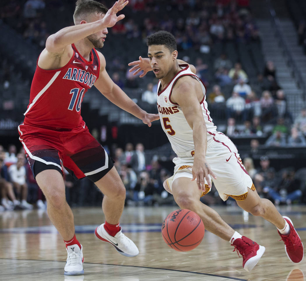 USC junior guard Derryck Thornton (5), a Findlay Prep graduate, drives past Arizona senior forward Ryan Luther (10) in the first half during the Pac-12 tournament on Wednesday, March 13, 2019, at ...