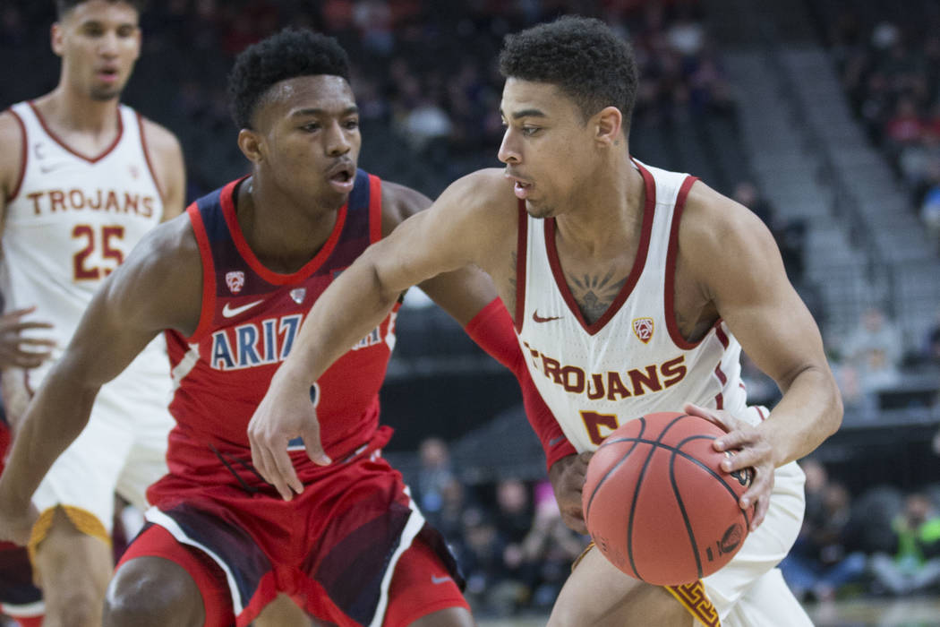 USC junior guard Derryck Thornton (5), a Findlay Prep graduate, drives past Arizona freshman guard Brandon Williams (2) in the first half during the Pac-12 tournament on Wednesday, March 13, 2019, ...