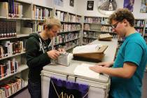 Dallas Larsen, left, and Luke Nelson study in the Foothill High School library in Henderson on Dec. 18, 2013. (Las Vegas Review-Journal, file)