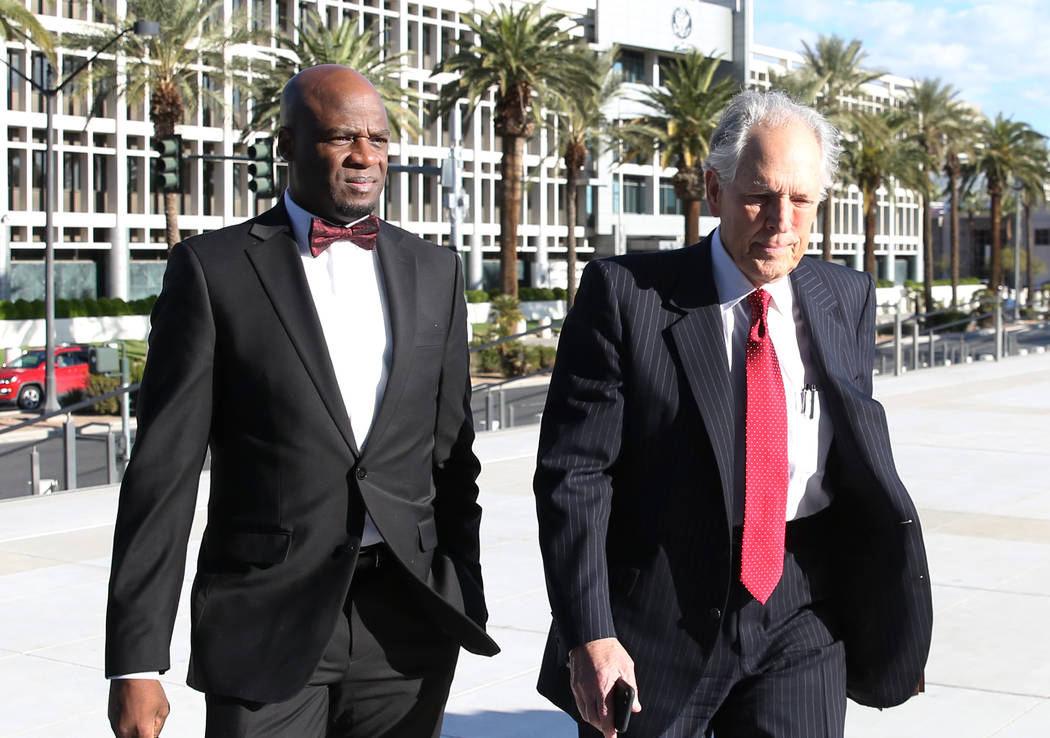 Former Nevada Senate Majority Leader Kelvin Atkinson, left, and his attorney, Richard Wright, arrive at the Lloyd George U.S. Courthouse on Monday, March. 11, 2019, in Las Vegas. Bizuayehu Tesfaye ...