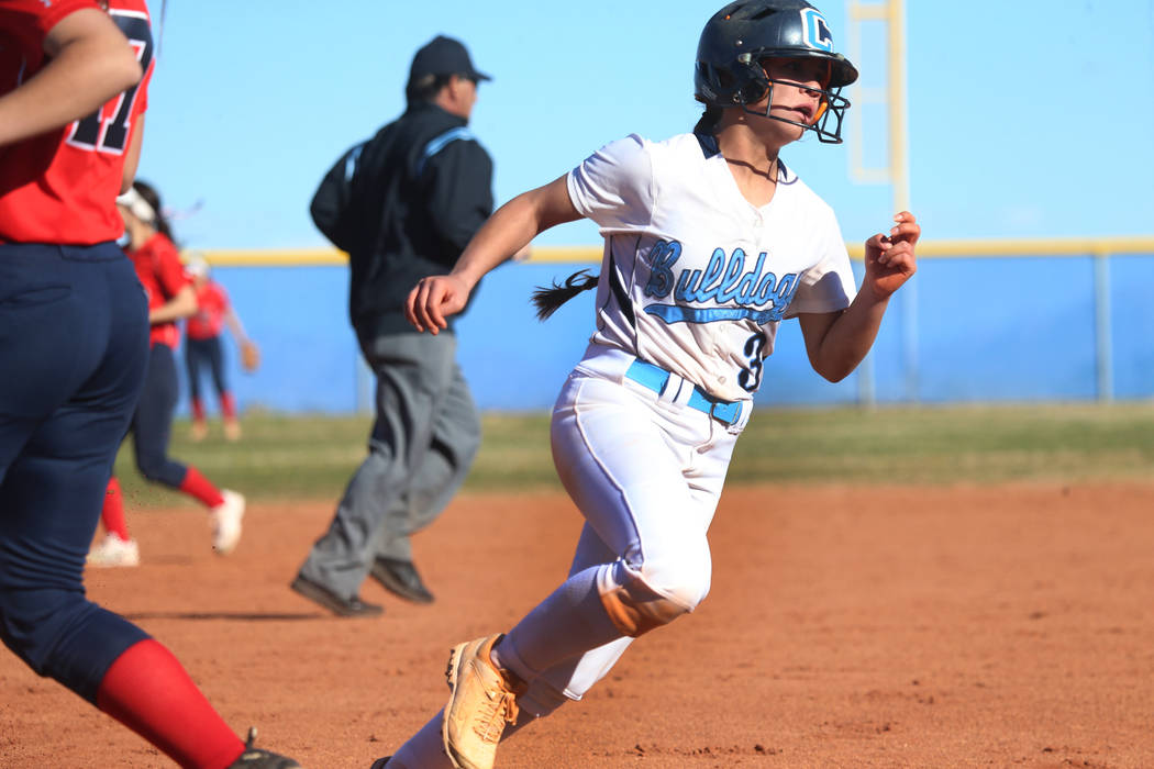 Centennial's Natasha Lawrence (3) runs home for a run against Coronado in the softball game at Centennial High School in Las Vegas, Wednesday, March 13, 2019. Erik Verduzco Las Vegas Review-Journa ...