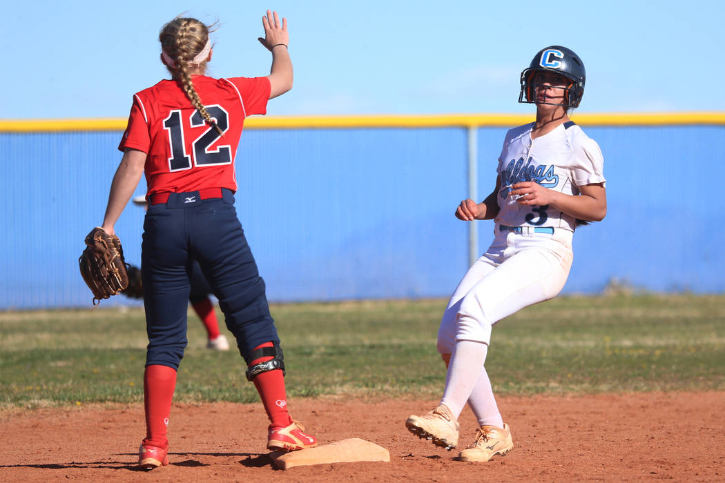 Centennial's Natasha Lawrence (3) runs to second base for a double against Coronado's Paige Sinicki (12) in the softball game at Centennial High School in Las Vegas, Wednesday, March 13, 2019. Eri ...