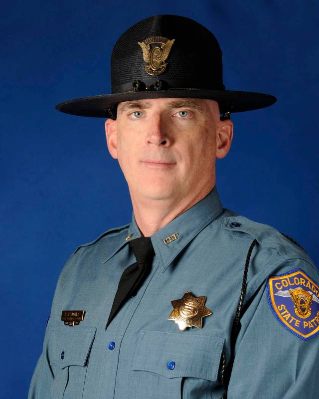 This undated photo provided by the Colorado State Patrol shows Cpl. Daniel Groves. The state patrol officer was hit and killed by a car as he was helping another driver who had slid off of Interst ...