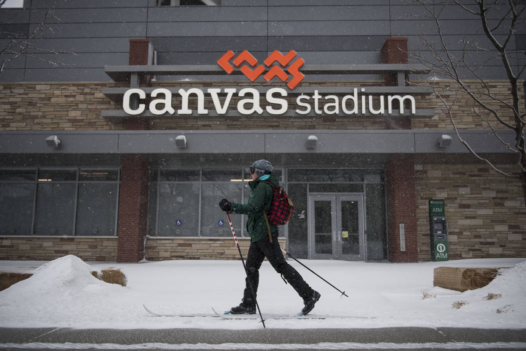 A cross country skier travels in the snow on Wednesday, March 13, 2019, in Fort Collins, Colo. A winter storm hit the western U.S., with blizzard conditions expected to engulf parts of Colorado, W ...
