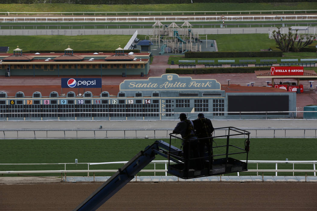 The home stretch and stands are empty at Santa Anita Park in Arcadia, Calif., Thursday, March 7, 2019. Extensive testing of the dirt track is under way at eerily quiet Santa Anita, where the death ...