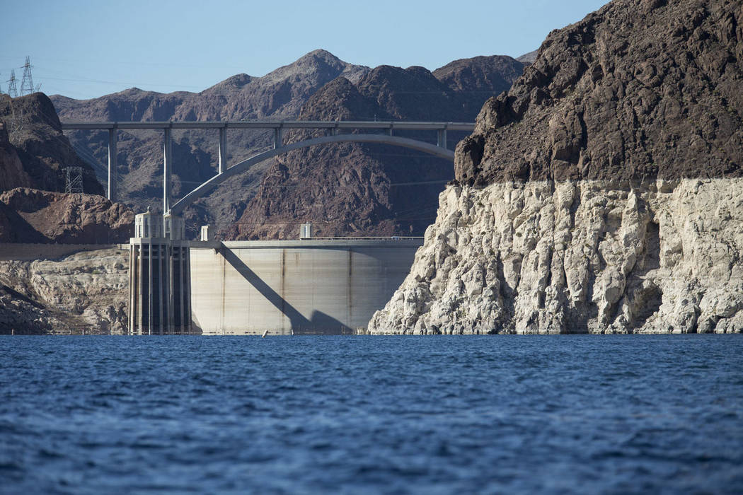 Hoover Dam and the Mike O'Callaghan-Pat Tillman Memorial Bridge are seen from the Colorado River's Black Canyon at Lake Mead National Recreation Area outside of Las Vegas on Wednesday, Oct. 17, 20 ...