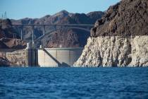 Hoover Dam and the Mike O'Callaghan-Pat Tillman Memorial Bridge are seen from the Colorado River's Black Canyon at Lake Mead National Recreation Area outside of Las Vegas on Wednesday, Oct. 17, 20 ...