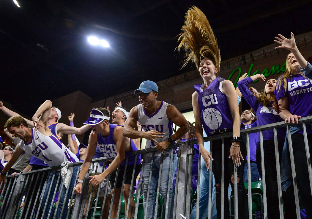 Fans in the Grand Canyon University student section cheer on their team in the second half of the opening round of the Western Athletic Conference tournament against Seattle University in Las Vega ...