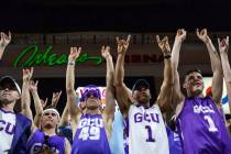 Fans in the Grand Canyon University student section "put their lopes up" to cheer on their team in the second half of the opening round of the Western Athletic Conference tournament agai ...