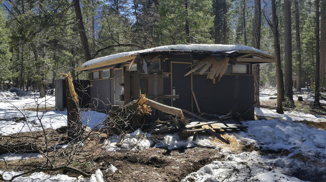 A damaged building after the recent heavy snowpack in Yosemite National Park, Calif. on Wednesday, March 13, 2019. The park announced that there will be late seasonal openings to facilities due to ...