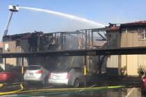 Fire crews battle a blaze at Solaire Apartments, 1750 Karen Ave., in Las Vegas on Aug. 5, 2018. (Clark County Fire Department)
