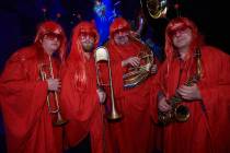 A band that looks like a group of Heat Misers celebrate the first anniversary of "Opium" at the Cosmopolitan of Las Vegas on Tuesday, March 12, 2019. (Spiegelworld)