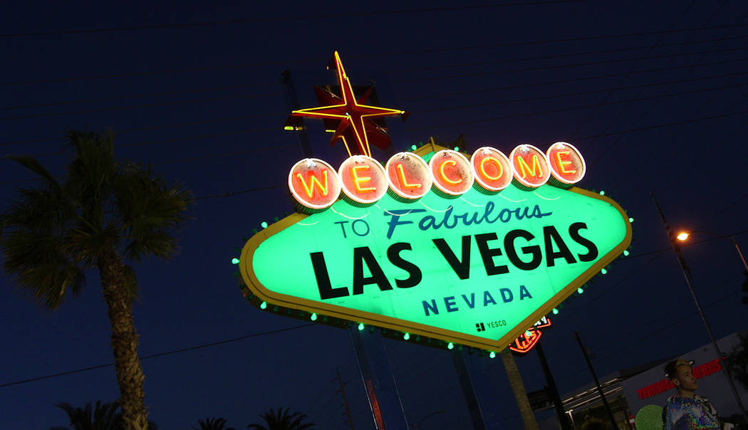 The "Welcome to Fabulous Las Vegas" sign goes green on Thursday, March 14, 2019 in celebration of St. Patrick's Day. (Mat Luschek/Las Vegas Review-Journal)