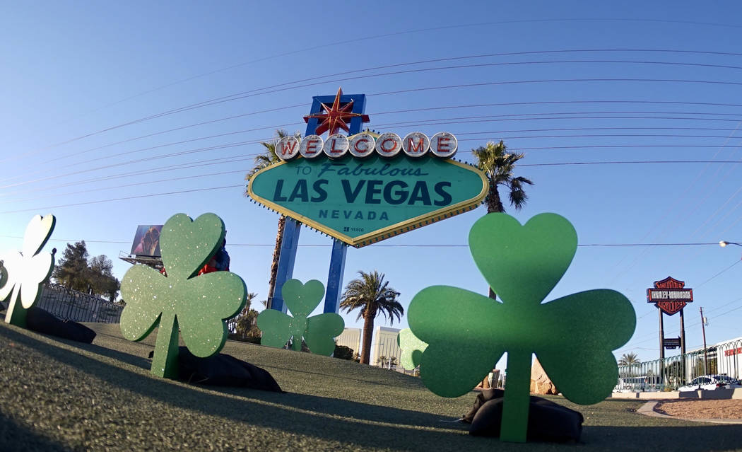 The "Welcome to Fabulous Las Vegas" sign goes green on Thursday, March 14, 2019 in celebration of St. Patrick's Day. (Mat Luschek/Las Vegas Review-Journal)