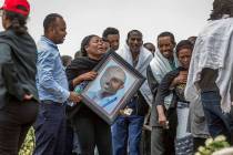 Ethiopian relatives of crash victims mourn and grieve at the scene where the Ethiopian Airlines Boeing 737 Max 8 crashed shortly after takeoff on Sunday killing all 157 on board, near Bishoftu, so ...