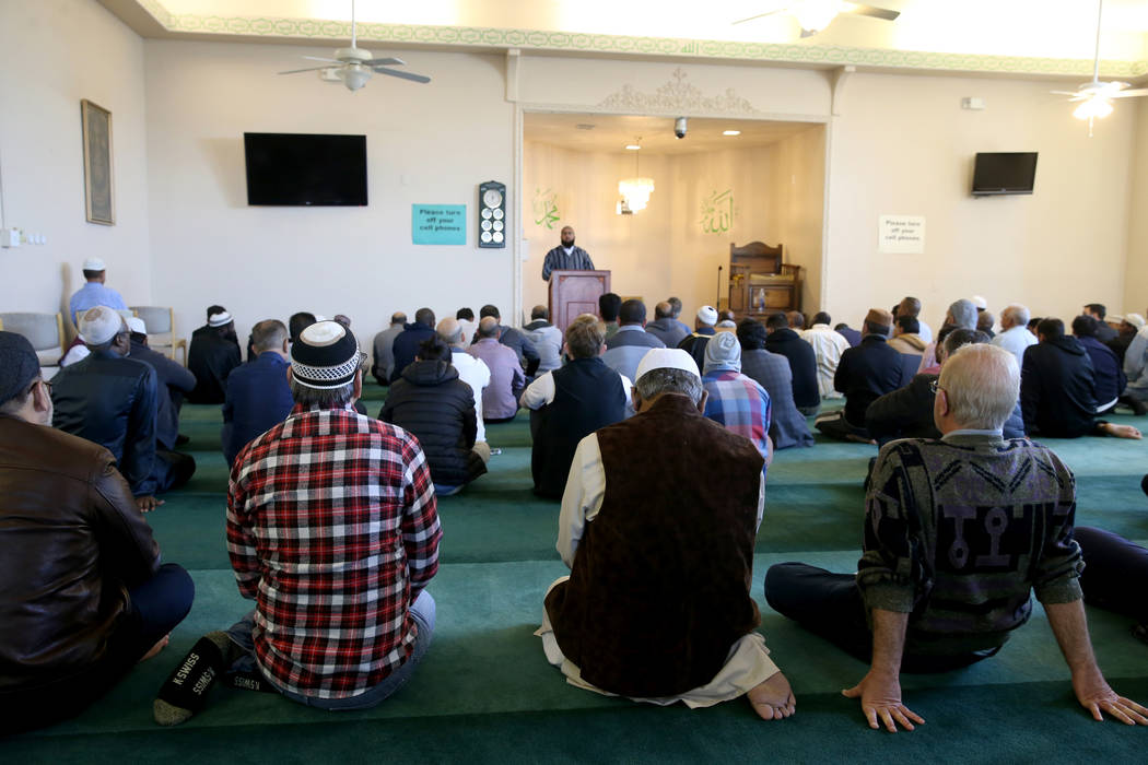 Worshipers listen to Shaykh Obair Katchi, imam of Corona Masjid in California, during a prayer service at the Mosque of Islamic Society of Nevada in Las Vegas Friday, March 15, 2019. (K.M. Cannon/ ...