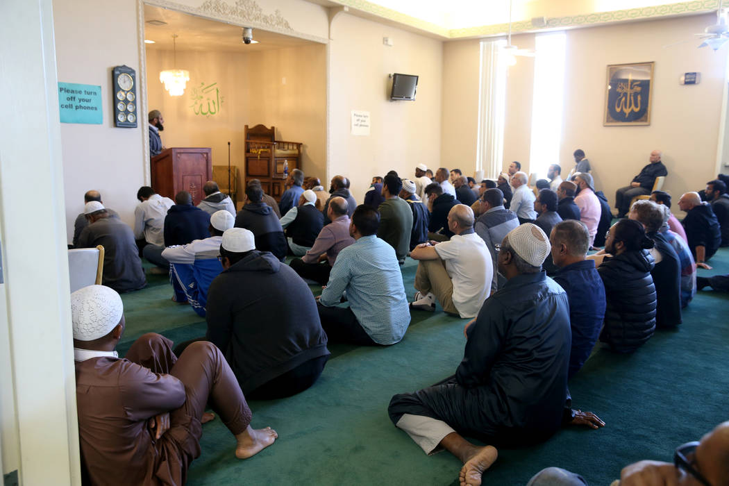 Worshipers listen to Shaykh Obair Katchi, Imam of Corona Masjid in California, during a prayer service at the Mosque of Islamic Society of Nevada in Las Vegas Friday, March 15, 2019. (K.M. Cannon/ ...