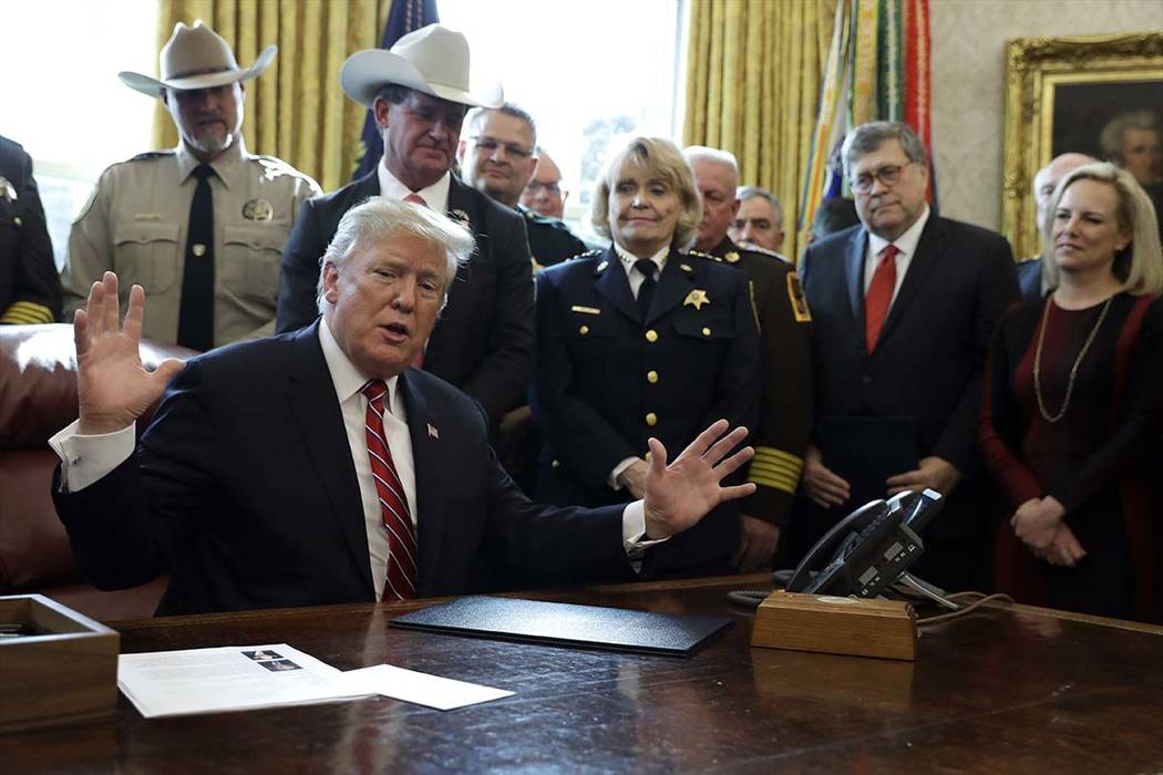 President Donald Trump speaks about border security in the Oval Office of the White House, Friday, March 15, 2019, in Washington. Trump issued the first veto of his presidency, overruling Congress ...