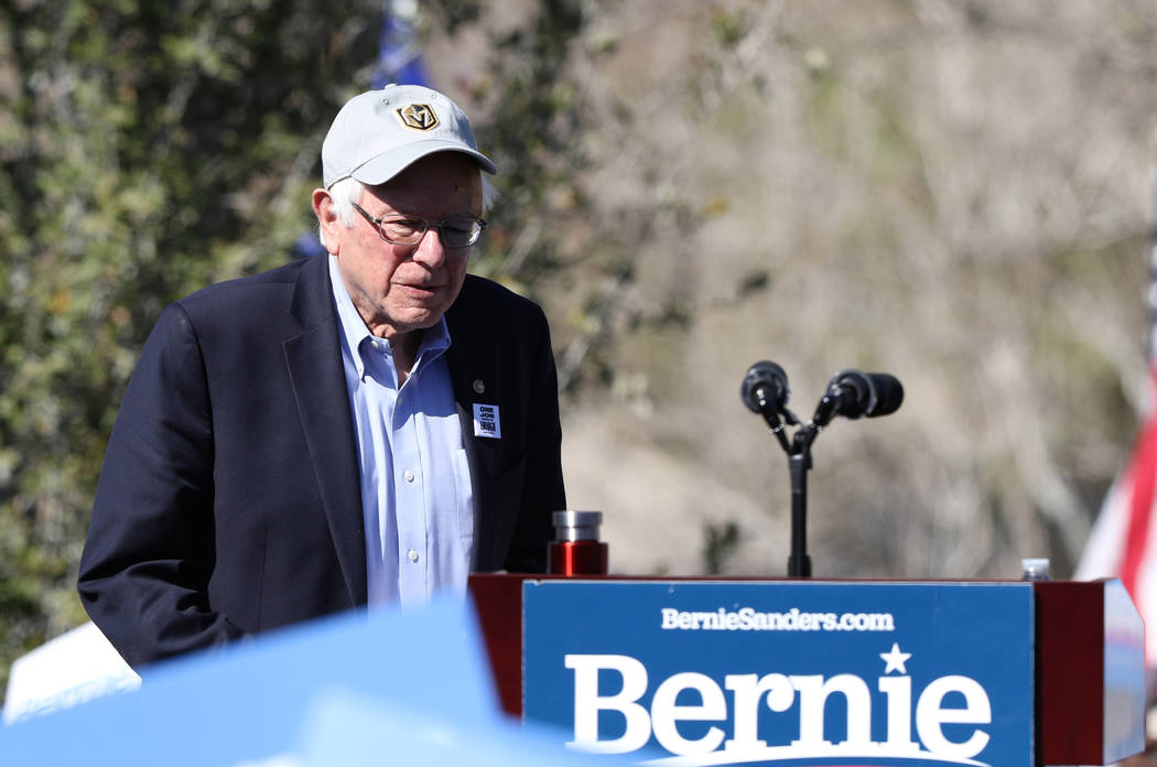 Democratic presidential candidate Sen. Bernie Sanders makes his way to the podium at a rally at Morrell Park in Henderson as part of his tour launching his presidential campaign, Saturday, March 1 ...