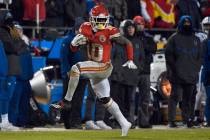 Kansas City Chiefs wide receiver Tyreek Hill (10) runs with the ball during the second half of an NFL divisional football playoff game against the Indianapolis Colts in Kansas City, Mo., Saturday, ...