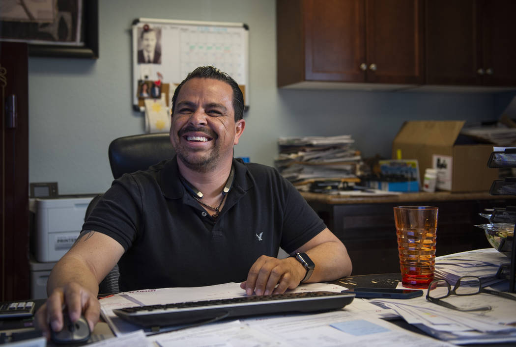 Victor Madrigal laughs while talking with a coworker at Lunas Construction in Las Vegas, Tuesday, March 19, 2019. (Caroline Brehman/Las Vegas Review-Journal) @carolinebrehman